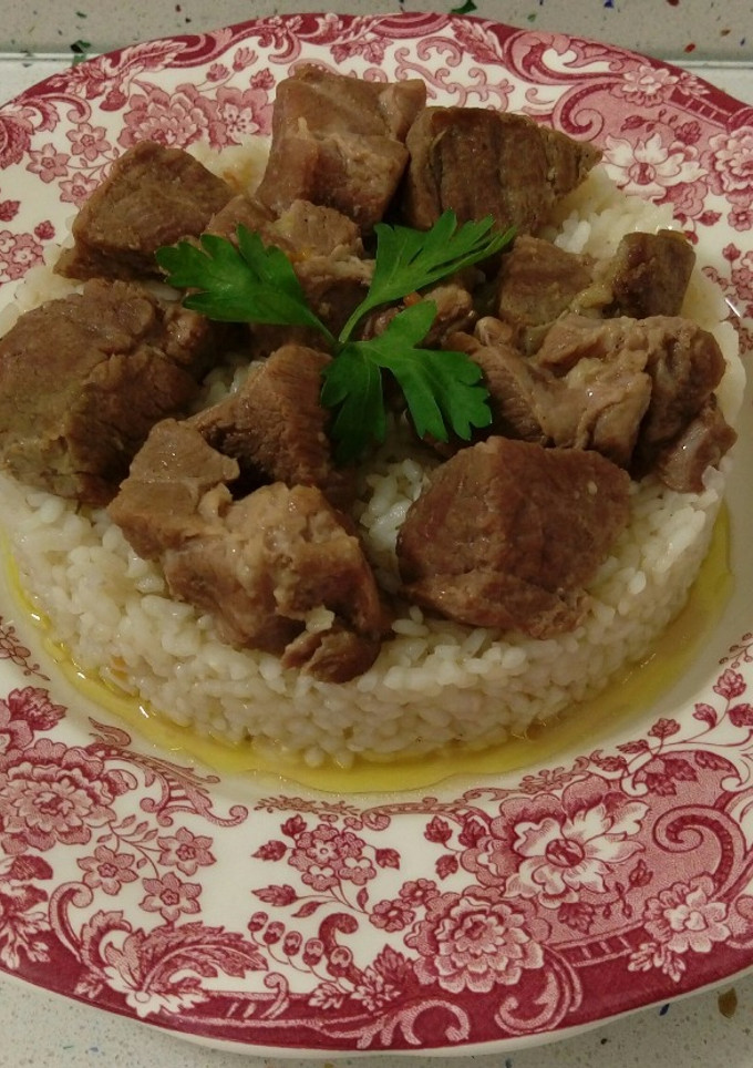 Una foto de Estofado de cerdo con arroz