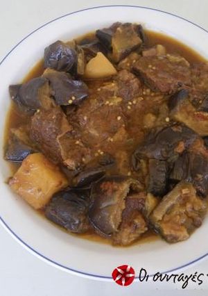 A picture of Aubergines skordostoumpi with potatoes à la Zante.