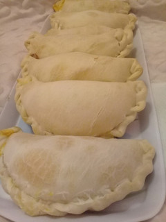Una foto de Empanadas de Calabaza, huevo y muzzarella