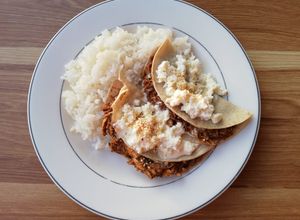 Una foto de Enmoladas con pollo