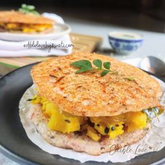 A picture of Veggie stuffed rava Utthapam.