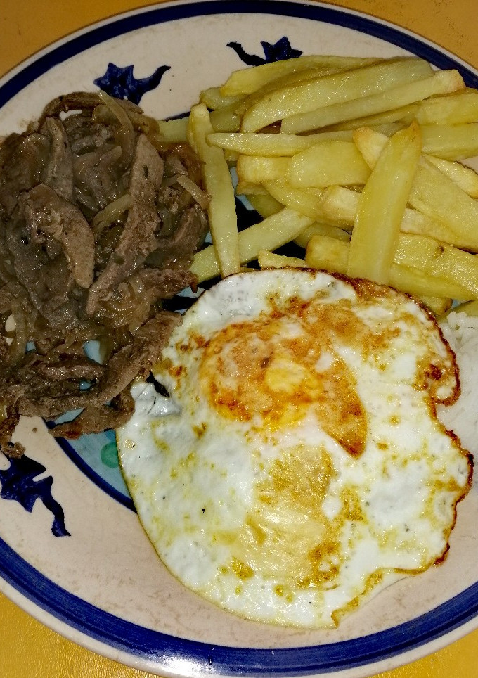 Una foto de Carne Encebollada