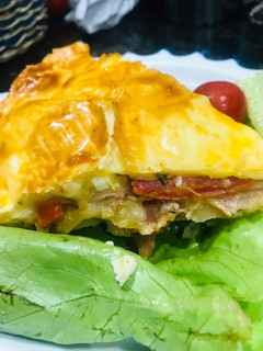 Una foto de Torta chivito♥️