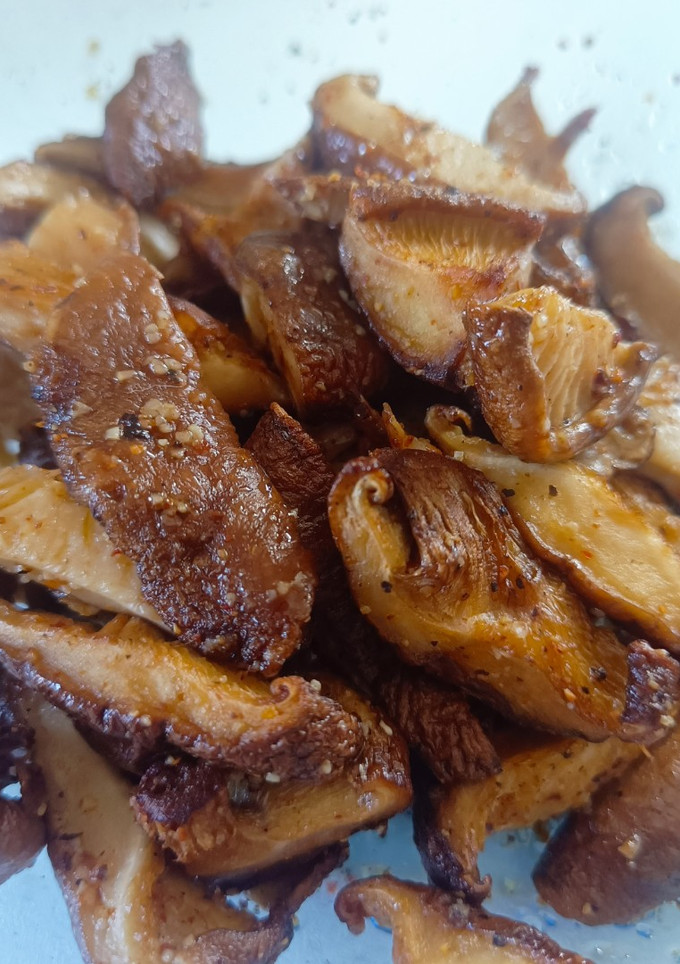 Una foto de Setas shiitake en freidora de aire