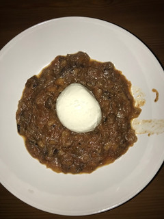 Una foto de Caponatta siciliana con mozzarella de Buffala