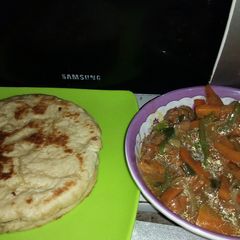 A picture of Chappati and veggy soup.