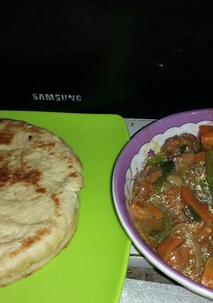 A picture of Chappati and veggy soup.