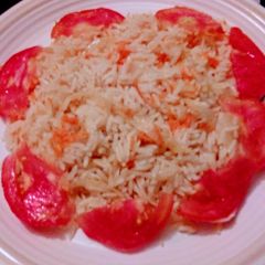 A picture of Onion rice with garlic and ginger.