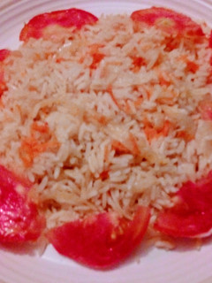 A picture of Onion rice with garlic and ginger.