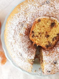 Una foto de Torta matera de mandarina con chips de chocolate 🍫🤤