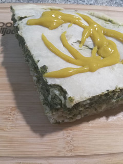 Una foto de PASTEL de PESCADO con ESPINACA