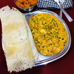 A picture of Cheese- Paneer ghotala dosa.