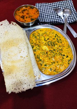 A picture of Cheese- Paneer ghotala dosa.