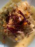 Merluzzo all'arancia con granella di noci e radicchio