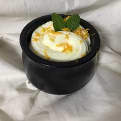 Una foto de Mousse de limón y de naranja
