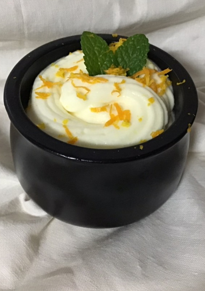 Una foto de Mousse de limón y de naranja