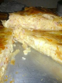 Una foto de Tarta de arroz con jamón y queso