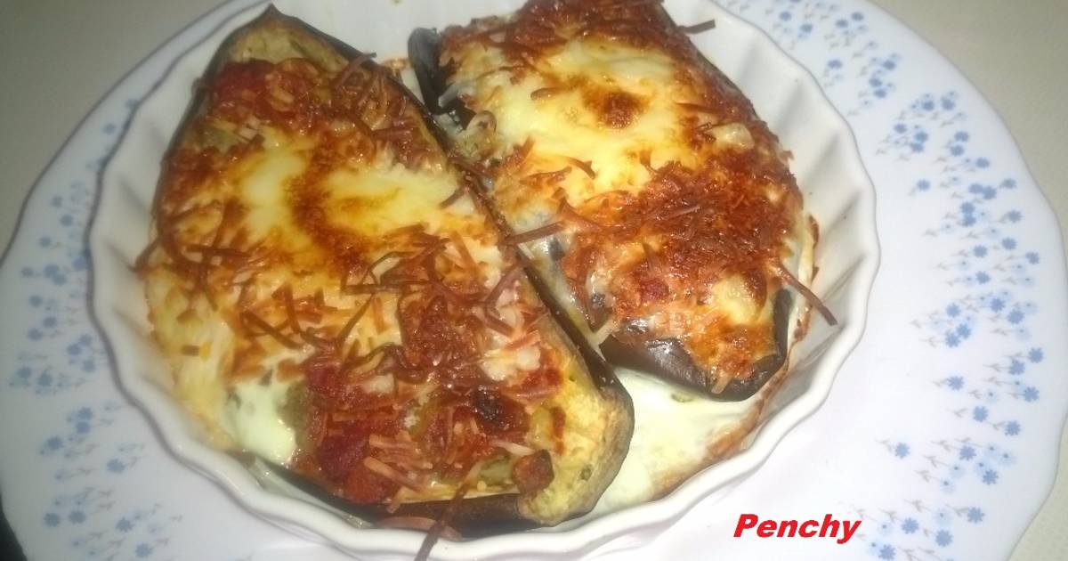 Berenjenas rellenas con salsa italiana de aceitunas y huevo secreto