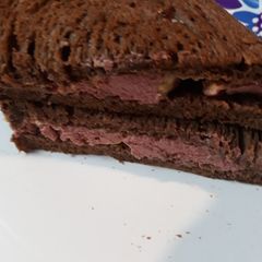 A picture of Braunschweiger on Buttered Pumpernickel Rye.