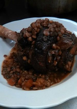 A picture of Lamb Shank w/ Lentils and Country Vegetables.