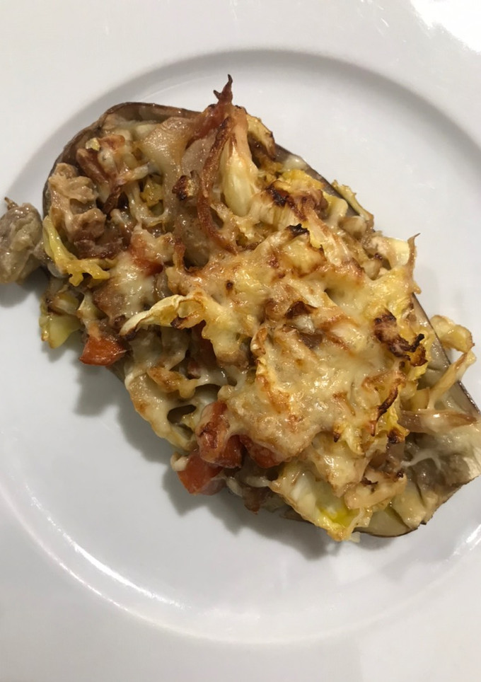 Una foto de Berenjenas rellenas de verduras