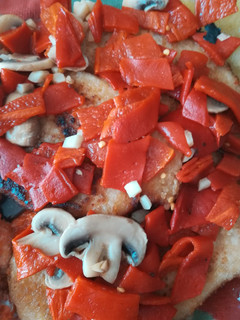 Una foto de Filetes empanados con pimientos de piquillo