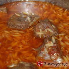 A picture of Beef with orzo in the pot.