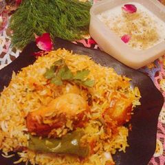 A picture of Kacchi Biryani.    Cuisine: Bangladeshi.