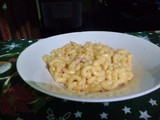 Coditos con queso cheddar