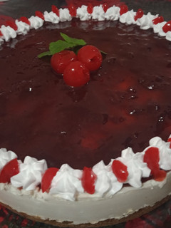 Una foto de Cheesecake de cereza para Navidad