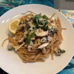 A picture of Chicken sausage and exotic mushroom pasta.