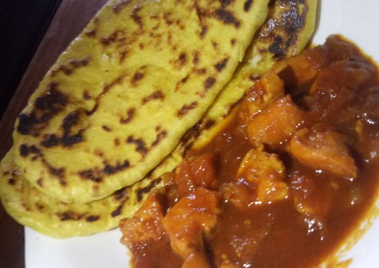 Butter naan with spicy chicken curry