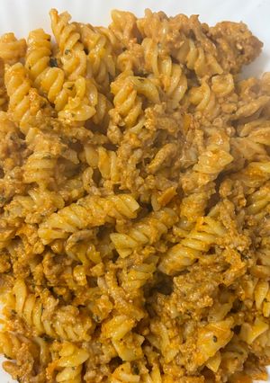 Una foto de Pasta con carne y queso
