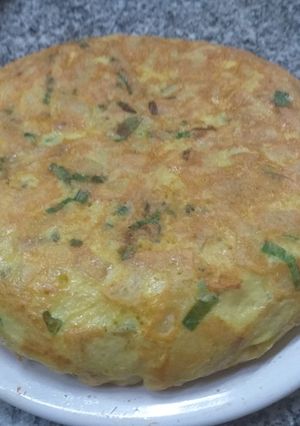 Una foto de Tortilla de papá con verdeo