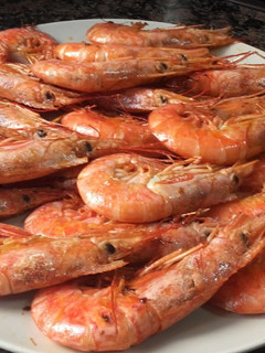 Una foto de Langostinos a la plancha
