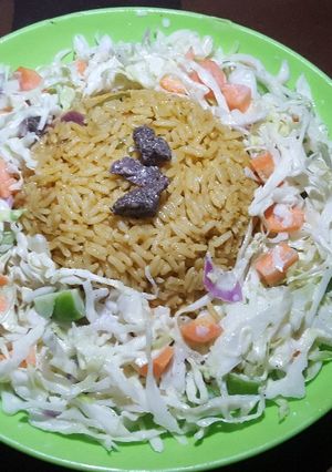 A picture of J Rice with beef salad.