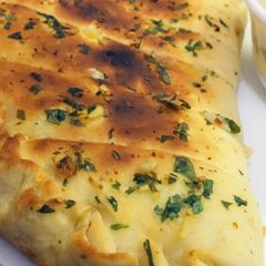 A picture of Cheesy garlic bread.