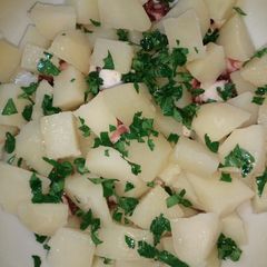 A picture of Potato and octopus salad.