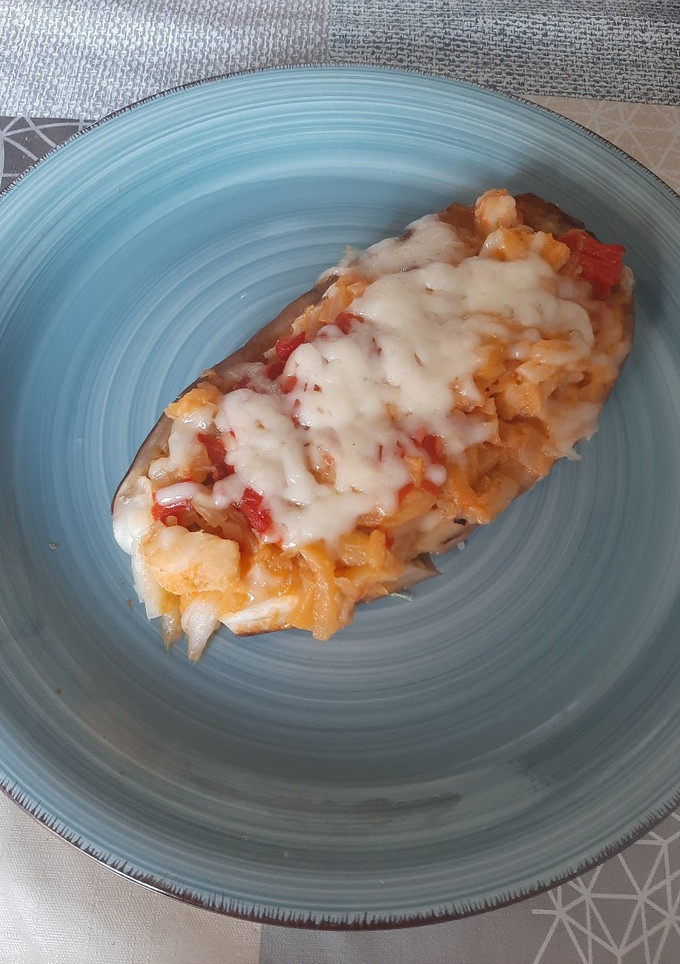 Una foto de 🍆 Berenjenas rellenas de bacalao 🐟 con tomate