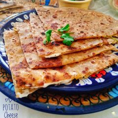 "Potato Cheese Paratha" A picture of "Potato Cheese Paratha".