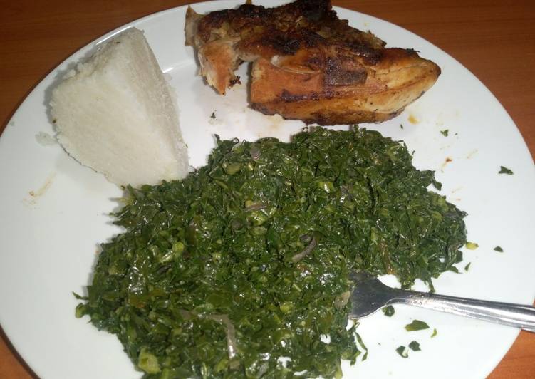 Grilled chicken served with fried kales &amp; ugali
