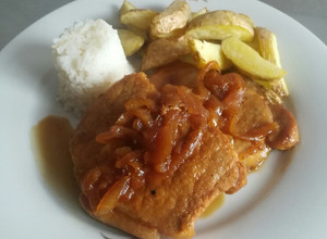 Una foto de Lomo de cerdo en salsa de panela y cebolla