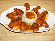 Una foto de pollo con salsa de soya