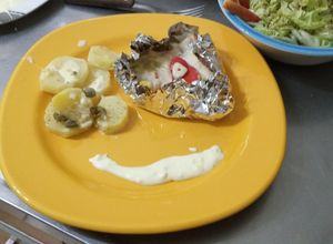 Una foto de Filet de lomito de atún en papillón, cocinado en parrigas