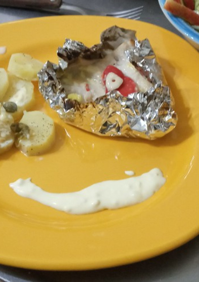 Una foto de Filet de lomito de atún en papillón, cocinado en parrigas