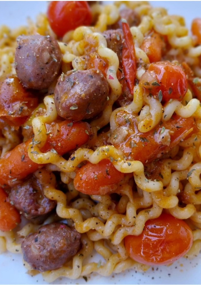 Una foto de Fusilli lunghi con ragú de butifarra