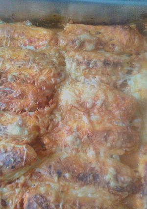 Une photo de Quenelles en sauce tomate