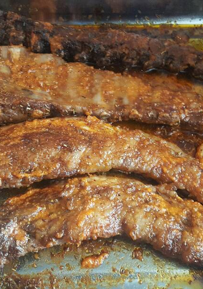 Una foto de Costillas al horno con salsa