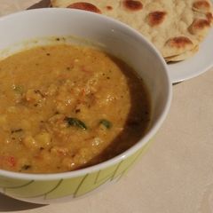 Naan bread with potato soup A picture of Naan bread with potato soup.