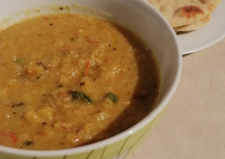 Naan bread with potato soup